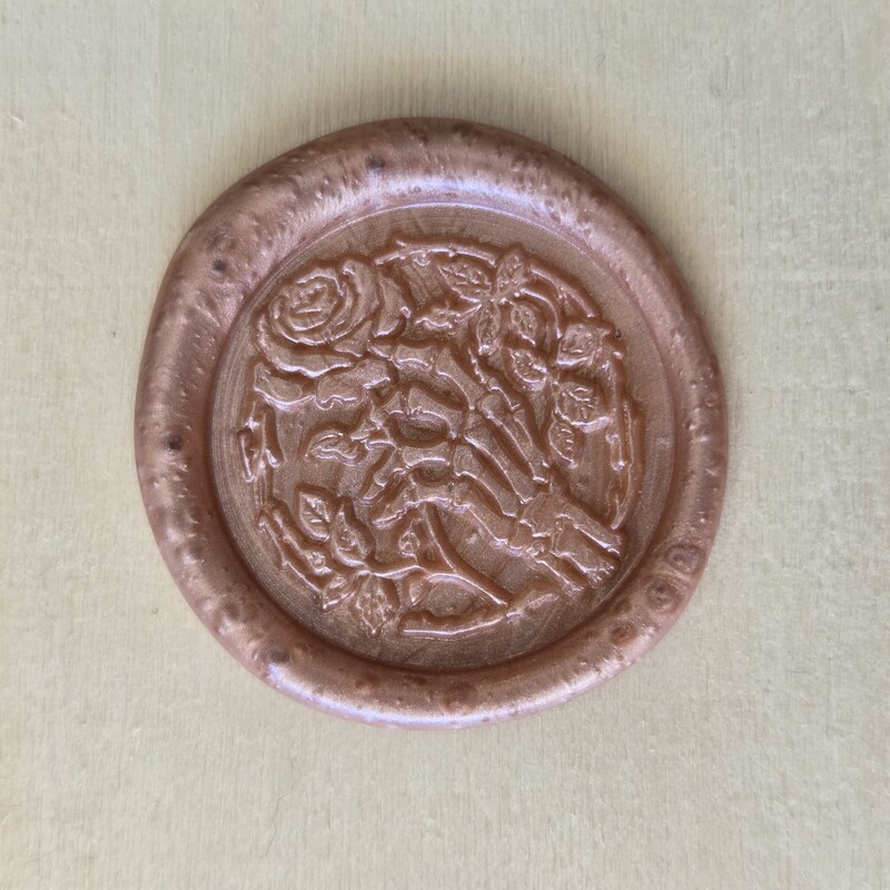 Skeleton hand rose seal